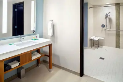 a bathroom with a sink and a shower at Hyatt Place Cleveland/Lyndhurst/Legacy Village in Lyndhurst