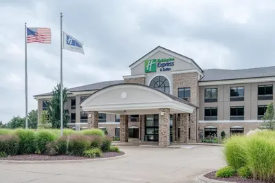 an office building with two flags in front of it at Holiday Inn Express & Suites Wadsworth by IHG in Wadsworth