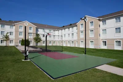 a basketball court in front of a large building at Staybridge Suites Cleveland Mayfield Heights Beachwood by IHG in Mayfield Heights