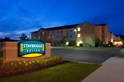 a sign in front of a building at night at Staybridge Suites Cleveland Mayfield Heights Beachwood by IHG in Mayfield Heights