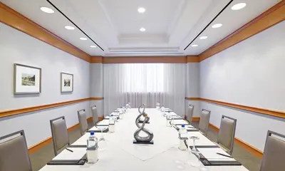 a conference room with a long table and chairs at InterContinental Cleveland by IHG in Cleveland