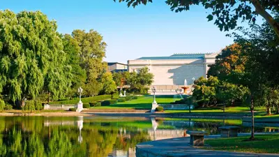 a park with a pond in front of a building at InterContinental Suites Hotel Cleveland by IHG in Cleveland