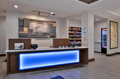 a lobby of a store with a large blue display at Holiday Inn Express Hotel & Suites Cincinnati - Mason by IHG in Mason