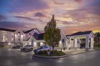a rendering of a hotel with cars parked in a parking lot at Best Western Columbus Airport in Columbus