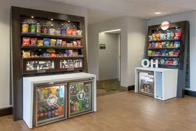 a store with two refrigerators in a room at Hampton Inn Cleveland-Solon in Solon