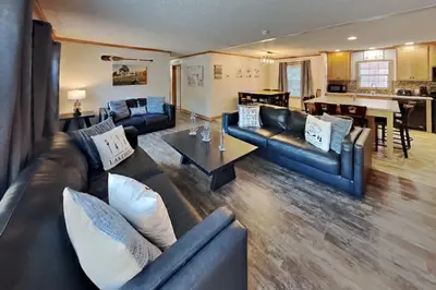 a large living room with couches and a table at Put-in-Bay Island Club #77 in Put-in-Bay