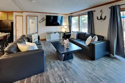 a living room with a couch and a table at Put-in-Bay Island Club #77 in Put-in-Bay