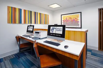 an office with a desk with a computer on it at Holiday Inn Express Hotel & Suites Athens by IHG in Athens