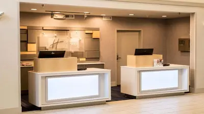 a store with two white counters with boxes at Holiday Inn Express - Columbus - Dublin by IHG in Dublin