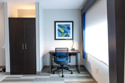 an office with a desk and a chair in a hallway at Holiday Inn Express - Columbus - Dublin by IHG in Dublin