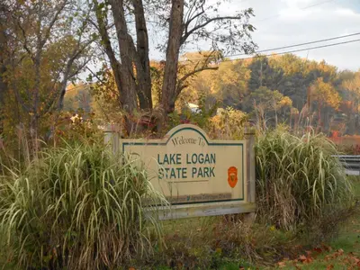 a sign for the lake local state park at Holiday Inn Express Hocking Hills-Logan by IHG in Logan