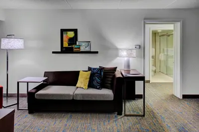 a living room with a couch and a table at Residence Inn by Marriott Cleveland Mentor in Mentor