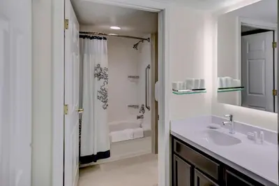 a bathroom with a sink and a shower at Residence Inn by Marriott Cleveland Mentor in Mentor