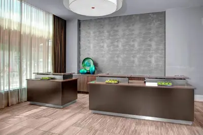 a lobby with two desks and a large window at Residence Inn by Marriott Cleveland Downtown in Cleveland