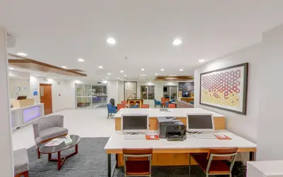 an office with a desk with a computer on it at Holiday Inn Express Fort Wayne - East - New Haven by IHG in New Haven
