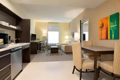 a room with a kitchen and a living room at Home2 Suites by Hilton Cincinnati Liberty Township in Wetherington