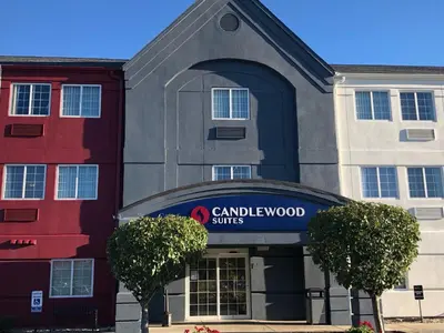 a rendering of the front of a cranwell hotel at Candlewood Suites Fort Wayne - NW by IHG in Fort Wayne