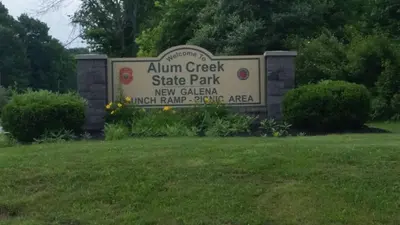 a sign for the almighty creek state park at Holiday Inn Express Hotel & Suites Delaware-Columbus Area by IHG in Sunbury