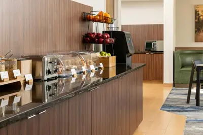 a kitchen with a counter with a coffee maker on it at Fairfield Inn and Suites by Marriott Cincinnati Eastgate in Eastgate