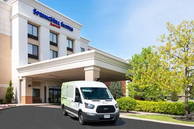 a white van parked in front of a hotel at SpringHill Suites by Marriott Cleveland Solon in Solon