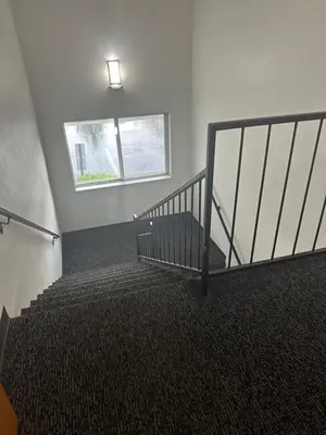 a staircase in a building with a window at Motel 6-Anderson, IN in Anderson