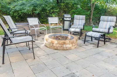 a group of chairs sitting around a fire pit at Fairfield Inn & Suites Canton in North Canton