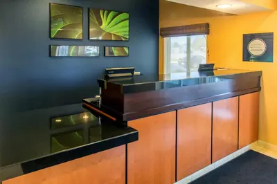 an office with a reception desk in a room at Fairfield Inn & Suites Canton in North Canton