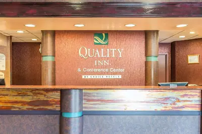 a sign for a quality inn and conference center at Quality Inn and Conference Center in Springfield