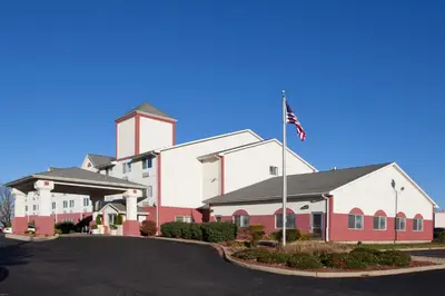 a church with an american flag in front of it at Holiday Inn Express Mt. Vernon by IHG in Mount Vernon