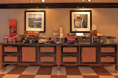 a large counter in a room with many appliances at Hampton Inn Defiance in Defiance
