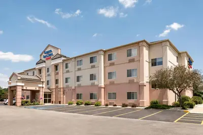 an image of a hotel with a parking lot at Fairfield Inn & Suites by Marriott Toledo Maumee in Maumee