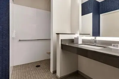 a bathroom with a sink and a mirror at Fairfield Inn & Suites Findlay in Findlay