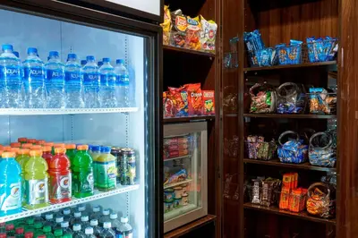 a refrigerator filled with lots of bottles of water at Fairfield Inn by Marriott Richmond in New Paris