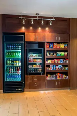 a refrigerator filled with lots of drinks and food at Fairfield Inn Muncie in Muncie