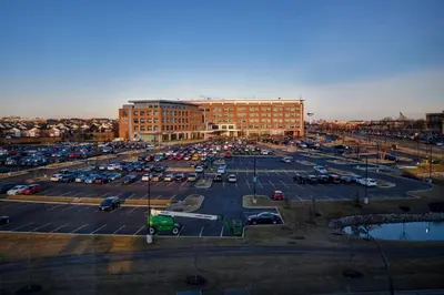 a parking lot full of cars in a parking lot at Residence Inn by Marriott Dayton Beavercreek in Beavercreek