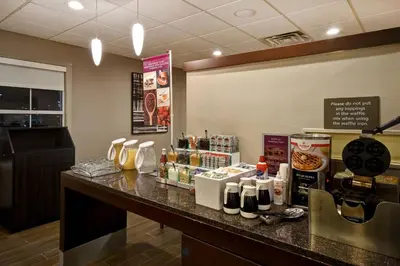 a counter in a fast food restaurant with a counter sidx sidx sidxasteryasteryastery at Residence Inn by Marriott Dayton Beavercreek in Beavercreek