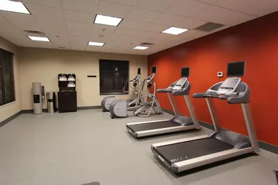 a gym with treadmills and cardio equipment in a room at Hilton Garden Inn Findlay in Findlay