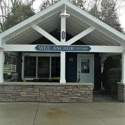a building with a sign that reads vice anchor college at Anchor Inn Boutique Hotel in Put-in-Bay