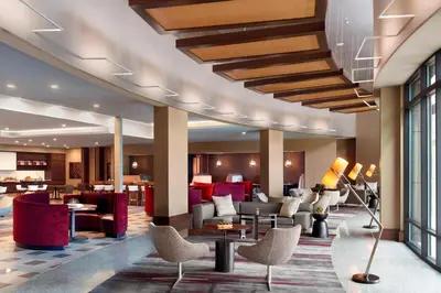 a lobby of a hotel with couches and chairs at Marriott Columbus OSU in Columbus