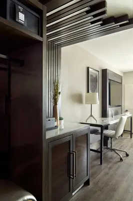 an office with a desk and a table with chairs at Marriott Columbus OSU in Columbus