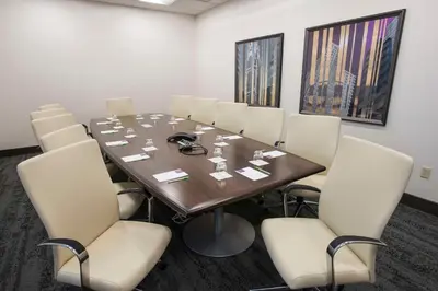 a conference room with a table and chairs at Hyatt Place Cincinnati/Sharonville Convention Center in Sharonville