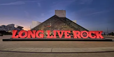 a large sign that reads long live rock in front of a building at Hotel Indigo Cleveland Downtown by IHG in Cleveland