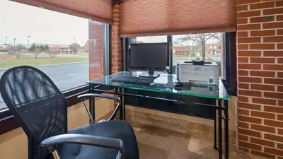 an office with a desk with a computer and a printer at Best Western Canal Winchester Inn-Columbus South East in Canal Winchester