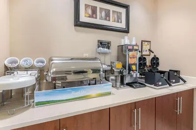 a hair salon counter with a hair salon appliance at Holiday Inn Express & Suites Hebron - Cincinnati Airport by IHG in Hebron