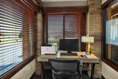 an office with a desk with a computer on it at Best Western Lakewood Inn in Hebron