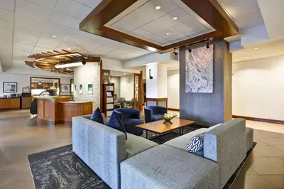 a lobby with a couch and a table at Hyatt Place Columbus Worthington in Worthington