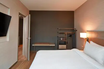 a bedroom with a bed and a desk in it at AC Hotel Columbus Dublin in Dublin