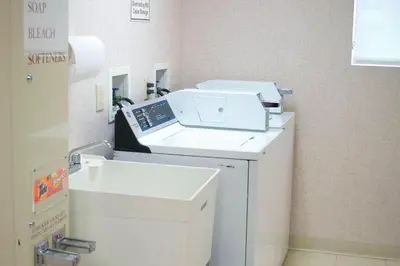 a hospital room with a machine and a sink at Residence Inn by Marriott Dayton Troy in Troy