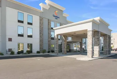 an office building with a parking lot in front of it at Comfort Inn Grove City - Columbus South in Grove City