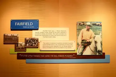 a display with a picture of a man riding a horse at Fairfield Inn & Suites by Marriott Weirton in Weirton